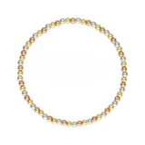 A beaded bracelet made of small round beads in alternating metallic gold, silver, and rose gold tones, arranged in a circular shape on a plain white background.