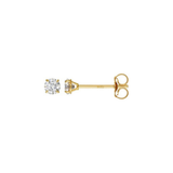 A pair of yellow gold stud earrings, one shown from the front with a round brilliant-cut clear gemstone and the other from the side showing the post and butterfly back, on a plain white background.