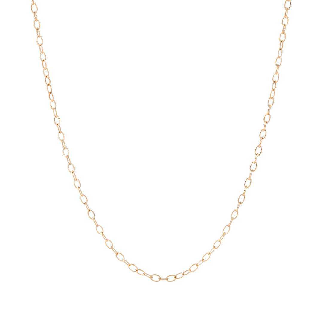 A delicate yellow gold filled cable chain on  a white background