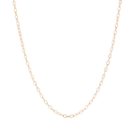 A delicate yellow gold filled cable chain on  a white background