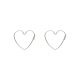 Heart shape silver earrings on a white background