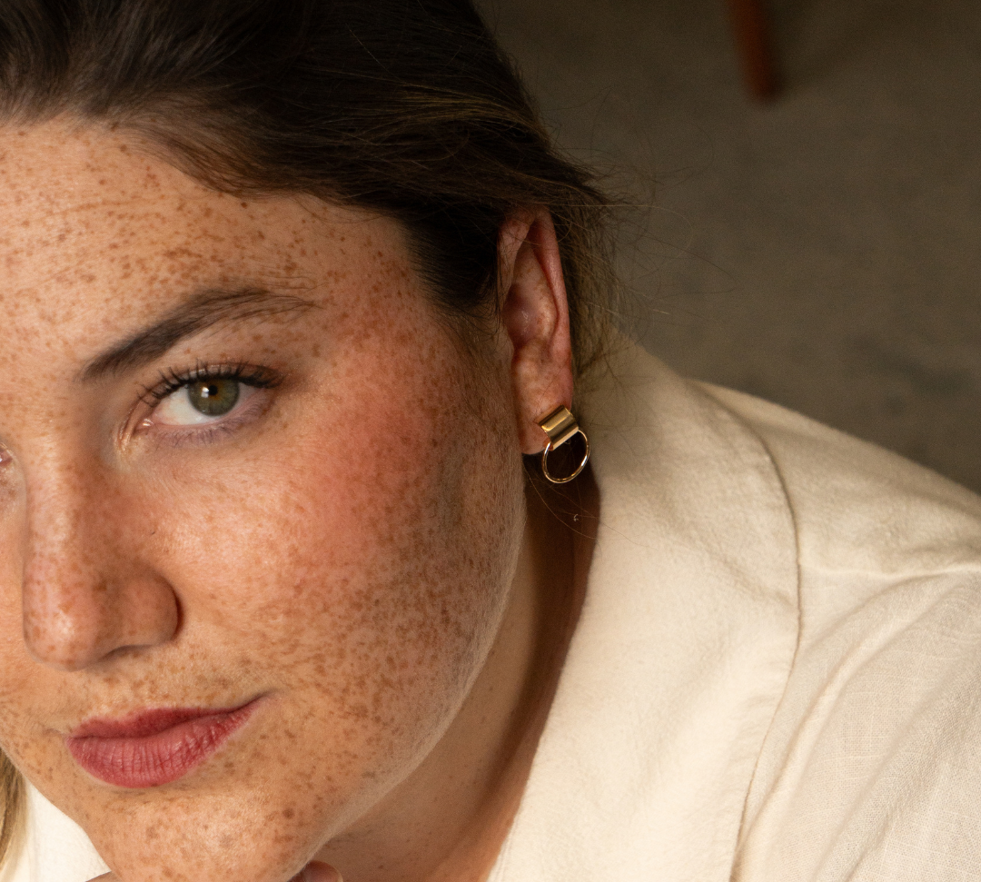 Model wearing i am brave earrings