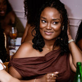 Woman wearing a herringbone chain
